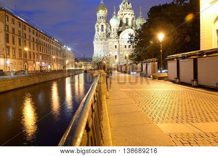 View of the Griboyedov Canal at night in St.Petersburg Russia.