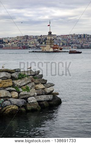 The Maiden's Tower (Turkish: Kız Kulesi) also known as Leander's Tower since the medieval Byzantine period is a tower lying on a small islet located at the southern entrance of the Bosphorus strait 200 m from the coast of Üsküdar in Istanbul Turkey.