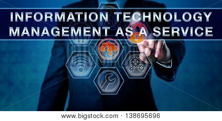 Corporate manager is pushing INFORMATION TECHNOLOGY MANAGEMENT AS A SERVICE on an interactive touch screen interface. Business metaphor and managed services concept.