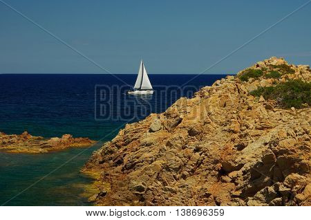 Sailboat along the coast of Sardinia, Italy