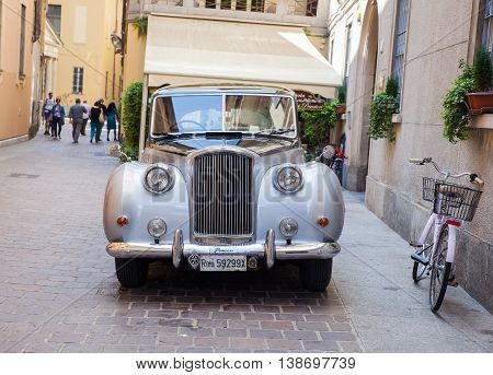 COMO, ITALY - JUNE, 12:  View of ancient Vanden Plas Princess limousine parked in the street on June 12, 2016