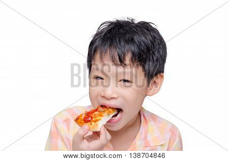 Little Asian child eating a piece of pizza