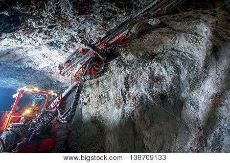 Gold mining underground inside a tunnel. russia