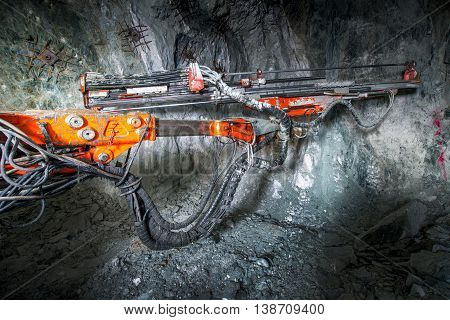 Gold mining underground inside a tunnel. russia