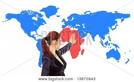 Happy young woman pointing on map
