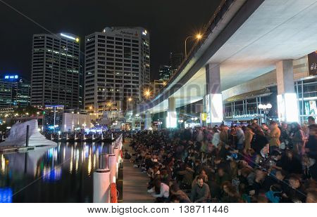 16 July 2016: Darling Harbour, Sydney AUSTRALIA: people waiting for the 8.30pm fireworks display at the Cool Yule Festival