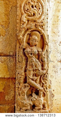 Sculptor of a beautiful angel standing at entrance of Bhoga Nandeeshwara, Chikaballapur captured on July 16th, 2016