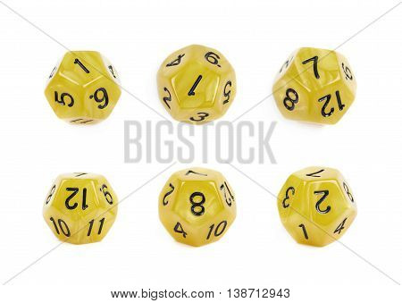 Yellow roleplaying polyhedral dodecahedron gaming plastic dice isolated over the white background, set of six different foreshortenings