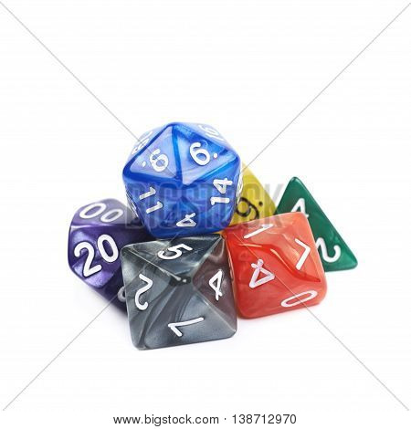 Pile of colorful roleplaying polyhedral dices isolated over the white background