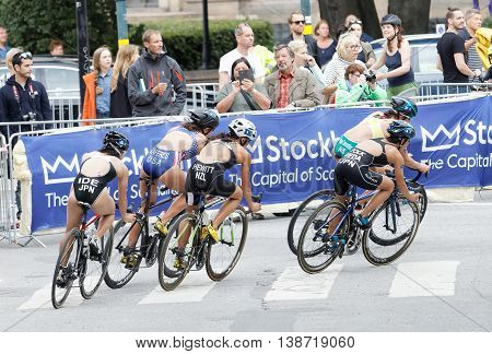 STOCKHOLM - JUL 02 2016: Side view of group of female triathlete cyclists in the Women's ITU World Triathlon series event July 02 2016 in Stockholm Sweden