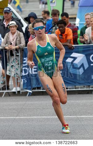 STOCKHOLM - JUL 02 2016: Triathlete Natalie Van Coevorden (AUS) running in a curve in the Women's ITU World Triathlon series event July 02 2016 in Stockholm Sweden