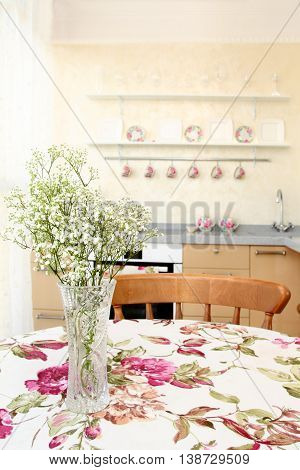 Interior Of The Modern Apartment, Table With A Bunch Of Flowers, A Vertical Shot