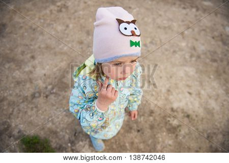 pensive girl in the hat. The view from the top