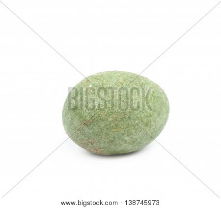 Green wasabi coated peanut isolated over the white background