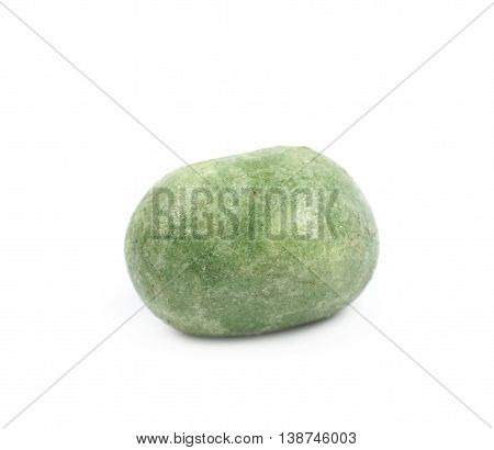 Green wasabi coated peanut isolated over the white background