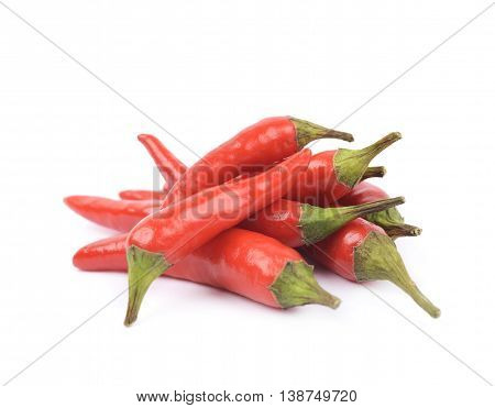 Pile of red italian peppers isolated over the white background