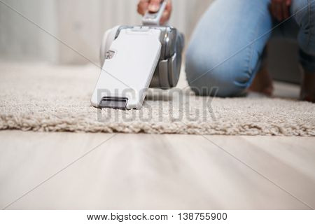 Closeup white cordless handheld vacuum cleaner
