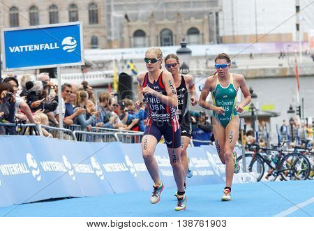 STOCKHOLM - JUL 02 2016: Group of triathletes running in the transition zone in the Women's ITU World Triathlon series event July 02 2016 in Stockholm Sweden