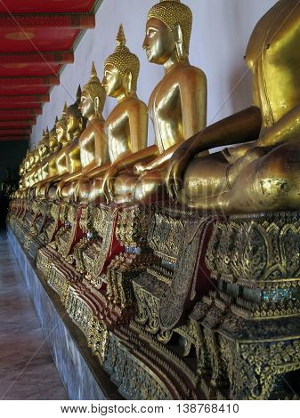 Ancient buddhist statues in Wat Po in Bangkok