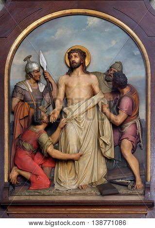 ZAGREB, CROATIA - SEPTEMBER 14: 10th Stations of the Cross, Jesus is stripped of His garments, Basilica of the Sacred Heart of Jesus in Zagreb, Croatia on September 14, 2015