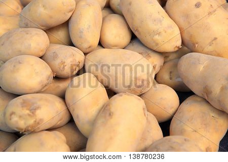 closeup of fresh potato selling on vegetable market