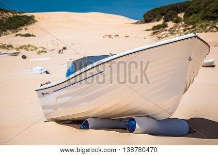 boat at bolonia beach a coastal village in the municipality of Tarifa in the Province of Cadiz in southern Spain.