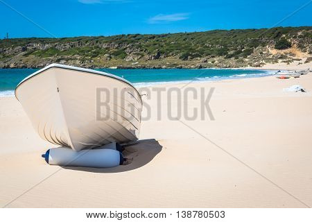 boat at bolonia beach a coastal village in the municipality of Tarifa in the Province of Cadiz in southern Spain.