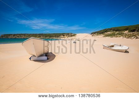 boat at bolonia beach a coastal village in the municipality of Tarifa in the Province of Cadiz in southern Spain.