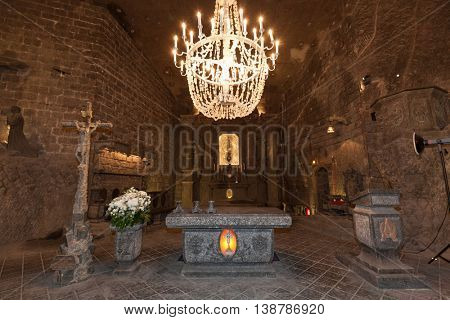 Wieliczka, POLAND - July 01:, 2016: Alter in St. Kinga's Chapel inside Wieliczka salt mine. UNESCO World Heritage Site