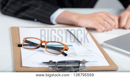 Female hands or woman office worker typing on the keyboard