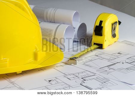 An Office Desk With The Project Papers