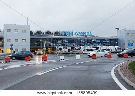 BUCHAREST, ROMANIA - MARCH 11, 2016: Passenger terminal of Henri Coanda International Airport. The airport was opened in 1969 on the place of military air base at Otopeni