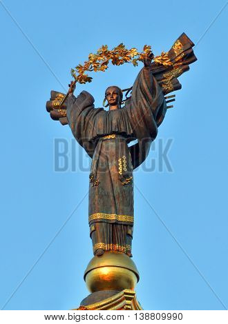 Monument of Bereginya on the stella in honor of the 10th anniversary of independence of Ukraine on the Independence Square in Kiev. Maidan Nezalezhosti Kyiv Ukrayna.