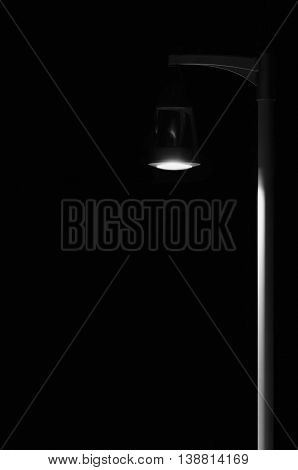 Bright Lit Outdoor Lantern Lamp Pole Post, Lonely Concept Solitude Metaphor, Illuminated Window Light, Vertical Deserted Night Park Scene Closeup, Black Isolated Copy Space Background