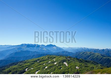 Mountain in Caucasus under blue sky