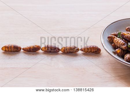 Fried Insects - Wood Worm Insect Crispy Walking Into The Dish On Woodern Background, Abstract, Conce