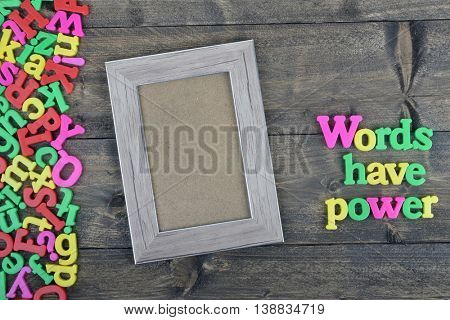 Words have power word on wooden table