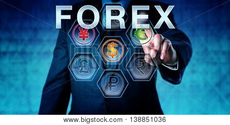 Interbank trader touching FOREX on an interactive control monitor. Business concept currency conversion and acronym for Foreign Exchange Market. Metaphor for monetary management. Close up torso shot.