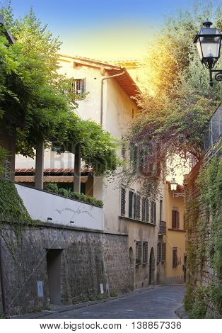Italy. Florence. Narrow small street in a sunny day