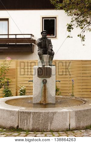 Fountain and monument at the birthplace of Hausham Wastl Witt