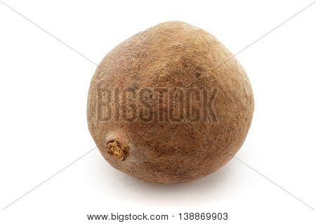 Organic dry Bahera or Beleric (Terminalia bellirica) seed. Isolated on white background. Macro close up. Top view.