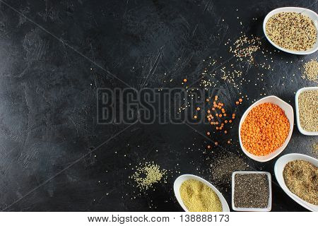 super food in bowls on dark ground
