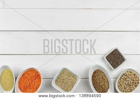 super food in bowls on dark ground