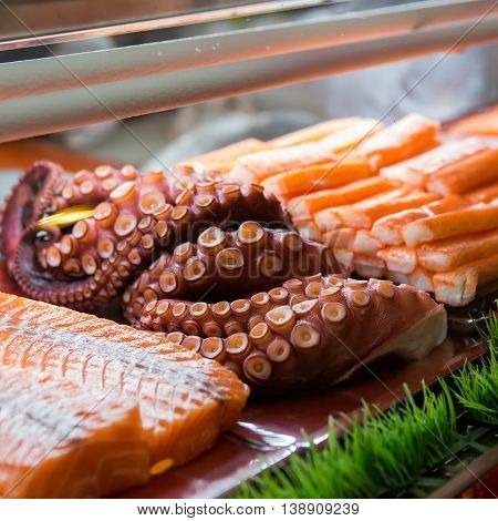 Food and Japanese food sashimi in glass box