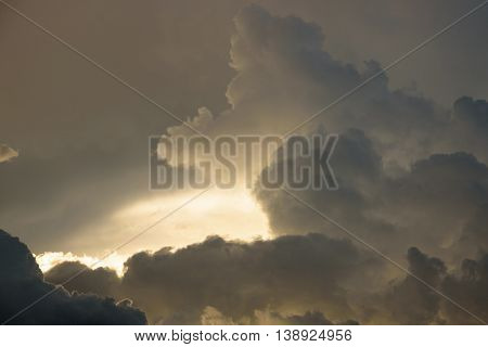 Background Of Golden Storm Clouds At Sunset.