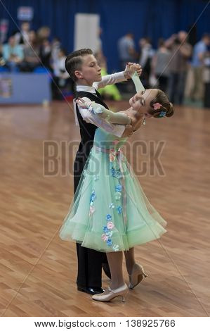 Minsk Belarus -May 28 2016: Unidentified Dance Couple Performs Juvenile-1 Standard European Program on National Championship of the Republic of Belarus in May 28 2016 in Minsk Republic of Belarus