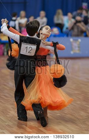 Minsk Belarus -May 28 2016: Gerasimchuk Vladislav and Zhuk Anastasiya Perform Juvenile-1 Standard European Program on National Championship of the Republic of Belarus in May 28 2016 in Minsk Republic of Belarus