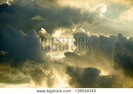 Background Of Golden Storm Clouds At Sunset.