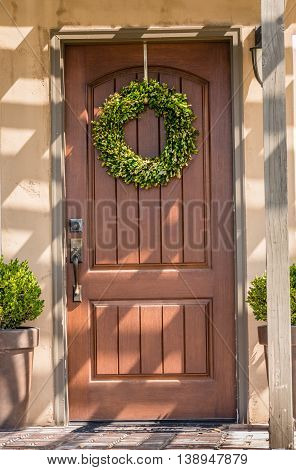 House Entrance Door With Inside Segment And Summer Wreath