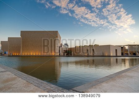 MANAMA, BAHRAIN - APRIL 17, 2016: The beautiful National Museum partially lit during the evening